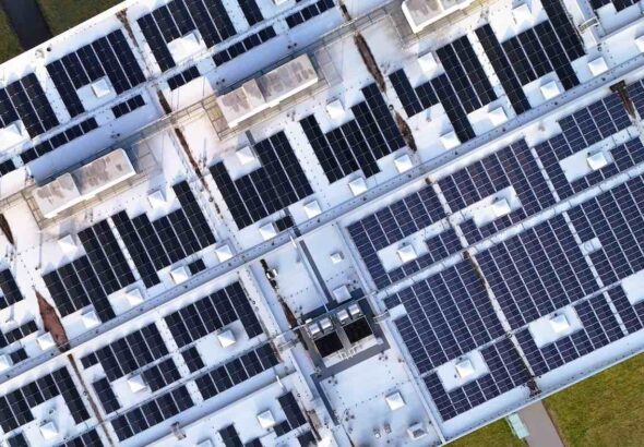 Aerial,View,Of,Rooftop,Solar,Panel,Installation,On,Industrial,Building